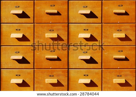 Brown antique wooden bureau drawers