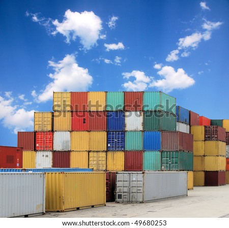 Colorful container and a blue sky with clouds