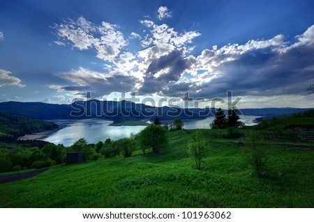 mountain and lake landscape in spring season, Romania