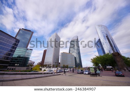 PARIS, FRANCE - SEPTEMBER 21, 2011: La Defense is the largest business district in Europe with 560 ha area, 72 glass and steel buildings and skyscrapers. wide view of La Defense buildings.