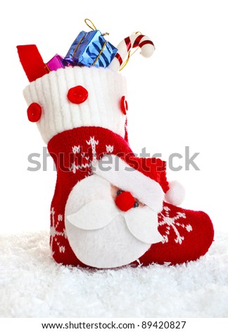christmas sock with present isolated on white background
