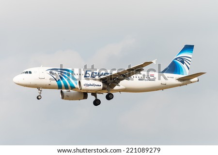 BRUSSELS - SEPTEMBER 30: Airbus A320-232 of Egyptair approaching Brussels Airport in Brussels, BELGIUM on SEPTEMBER 30, 2014. Egyptair is the flag carrier airline of Egypt.