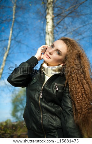 beautiful girl talk on the telephone