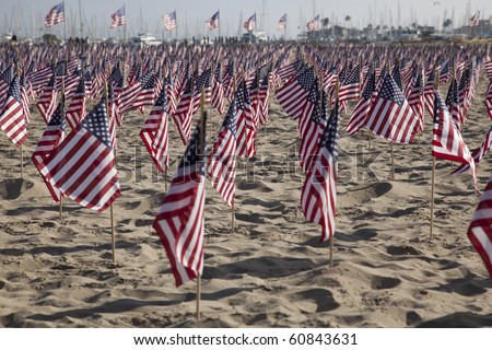 SANTA BARBARA, CA - SEP. 11: 2977 U.S. Flags placed on the beach by UCSB College Republicans and Young America\'s Foundation to remember those killed on 9/11/2001 on Sep. 11, 2010 in Santa Barbara, CA