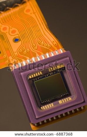 A digital camera sensor and its attached circuitry.