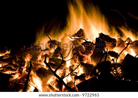A big winter bonfire warms a chilly night.