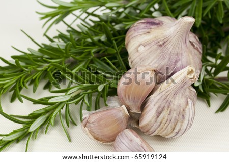 Two fragrant herbs, garlic and rosemary.