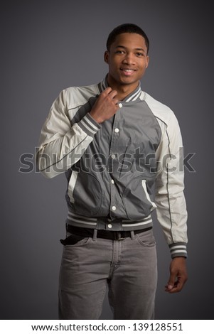 Casual Dressed Young African American Male Model Natural Looking on Grey Background