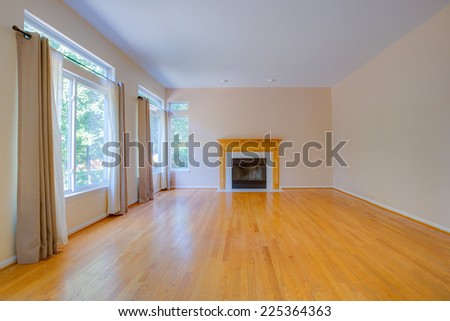 Traditional North America Single Family House Normal Empty Family Room with Fireplace Hardwood Floor Blank Wall Residential Home Interior