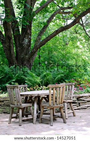 Old Wooden Cafeteria Table and Chairs under Big Tree