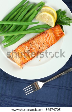 Straight View of Grilled Salmon Fillet with Green Beans Plate