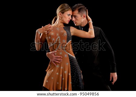 Ballroom Dancer Pair Dance Low Key on Black Background