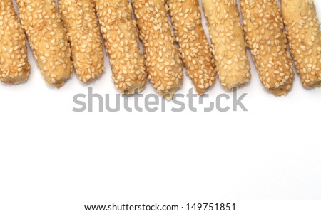 Baking bread with sesame stick isolated on the white background