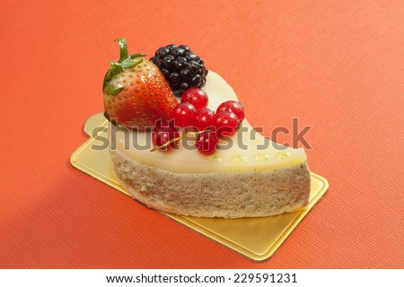 Green tea mouse cake with mixed berry fruits topping