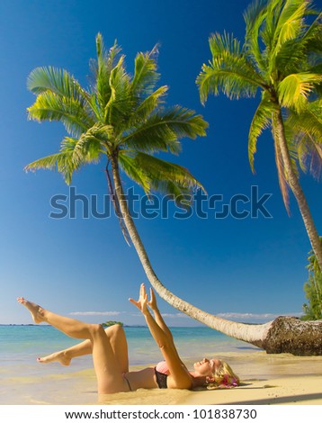 Tanning Pleasure On a Tropical Beach