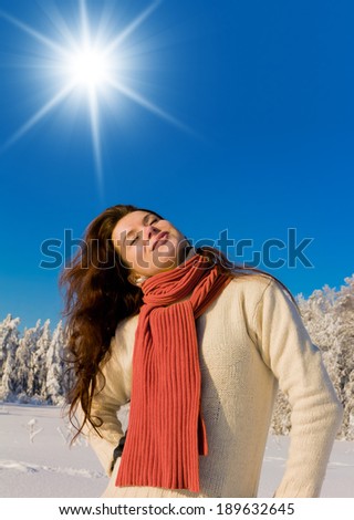 Beauty in warm clothes On a Sunny Day