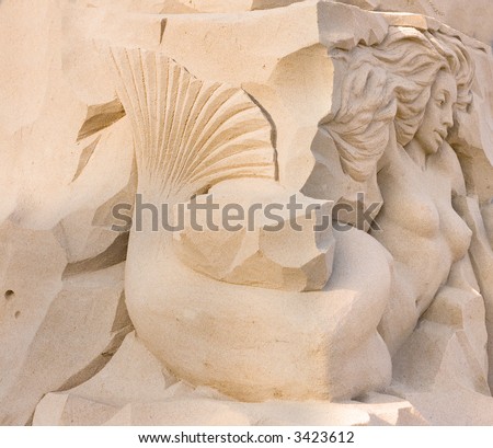 sand sculpture festival contest:   	 sand sculpture of mermaid