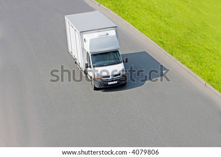 Blank white truck isolated on road