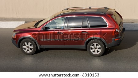 luxury suv car isolated on road. See many similar quality images in my portfolio