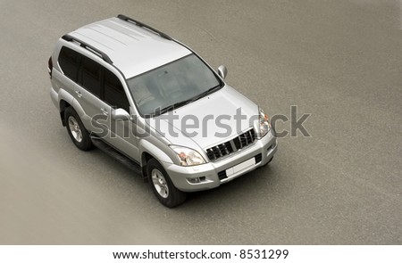 suv car isolated drives on road at speed from my \