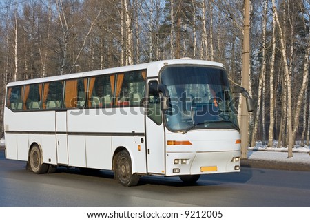 tourist blank white shuttle bus on road