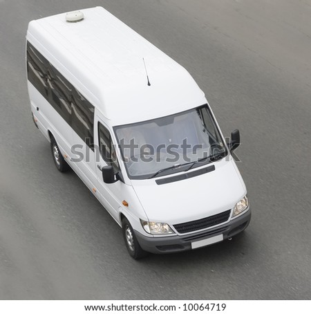 mini small passenger Tour van bus on road isolated