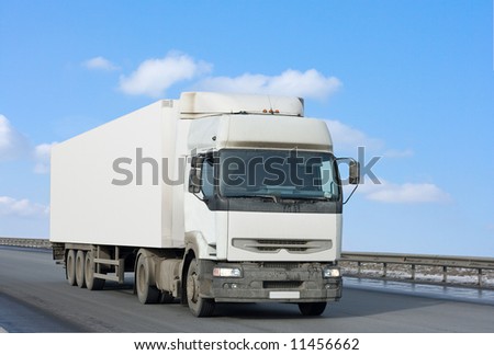 blank clean truck on blue clouded sky background  - See similar images of this \