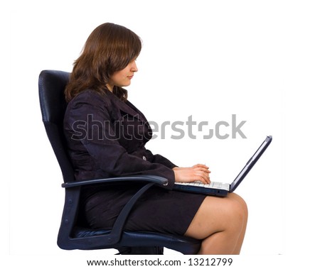 a woman in office clothes sits in a chair with notebook isolated  - See similar images of this \