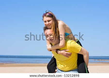 happiness on a beach - See similar images of this 