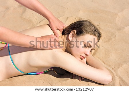 massage on a beach - See similar images of this \