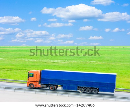 blue truck - green field