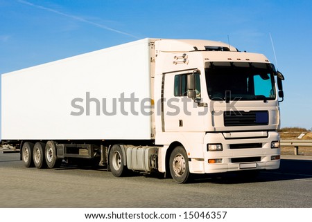 blank clean truck on blue clouded sky background