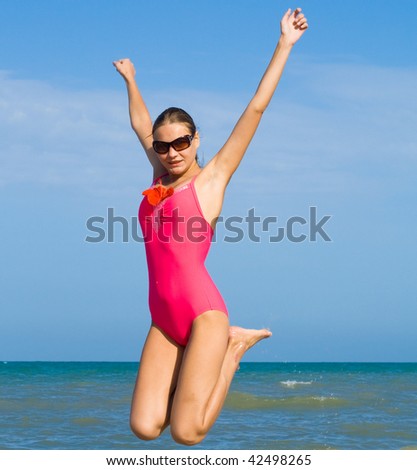 woman in pink swimsuit - super happy