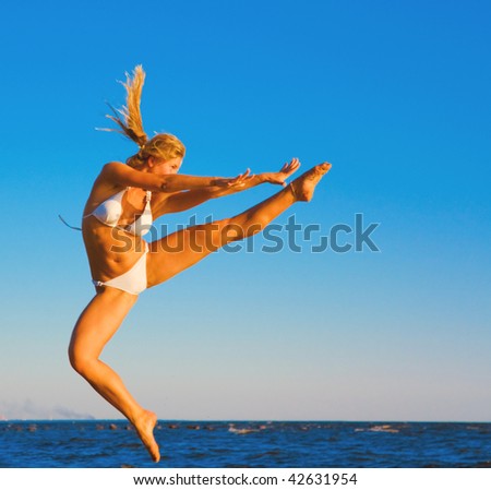 woman karate kicking