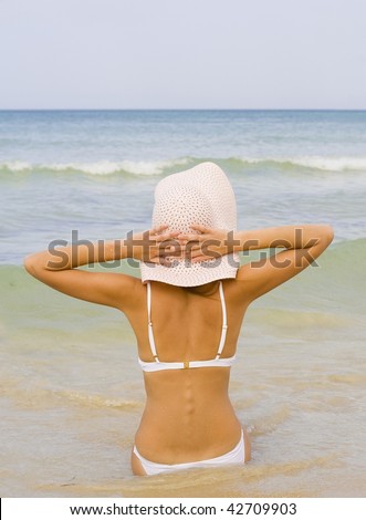 Serenity and peace. Woman watching the sea
