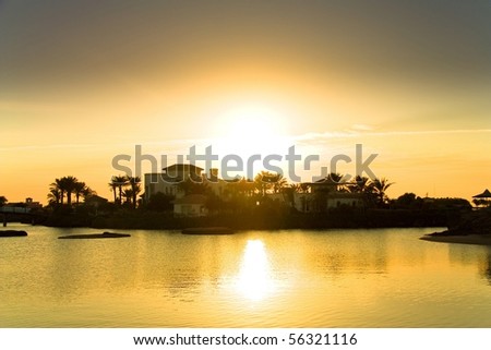 Golden Sunset over sleeping island village