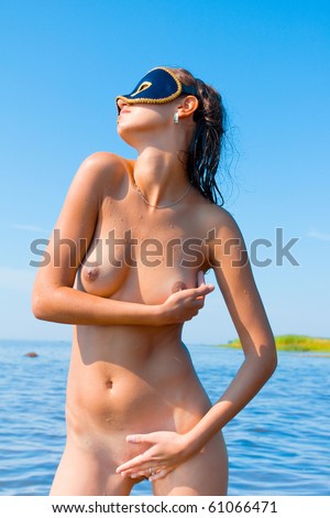 stock photo Naked Beach Fun Save to a lightbox Please Login