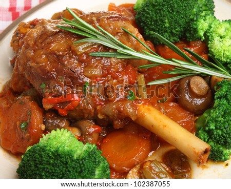 Lamb shank with vegetables dinner