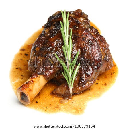 Lamb Shank Braised In An Onion Jus.