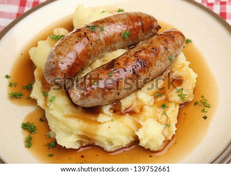 Sausages And Mashed Potato And Gravy.