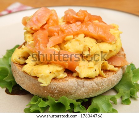 Scrambled egg and smoked salmon on toasted English muffin.