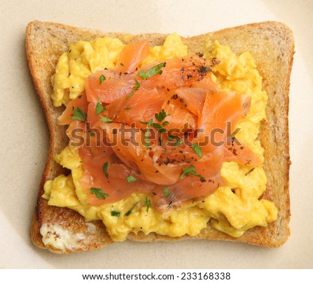 Smoked salmon and scrambled eggs on toast.