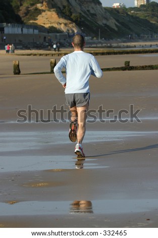 Male Jogger on Beach