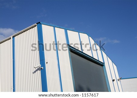 Industrial unit with roller shutter door