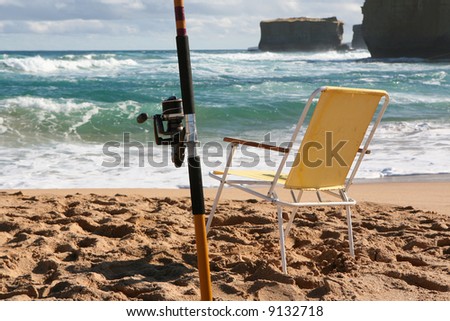 Fishing Rod and Folding Chair on a beach, Victoria, Australia
