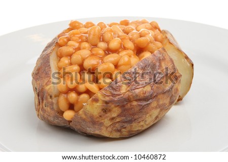 stock photo : Jacket potato filled with baked beans in tomato sauce