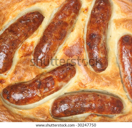 Sausages baked in batter known as \'Toad in the Hole\'
