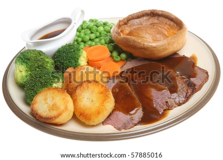 Roast beef dinner with Yorkshire pudding.