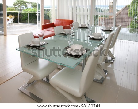 Modern dining table with scenic views from patio