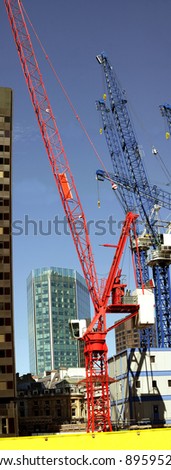 Colorful construction crane in City - London.